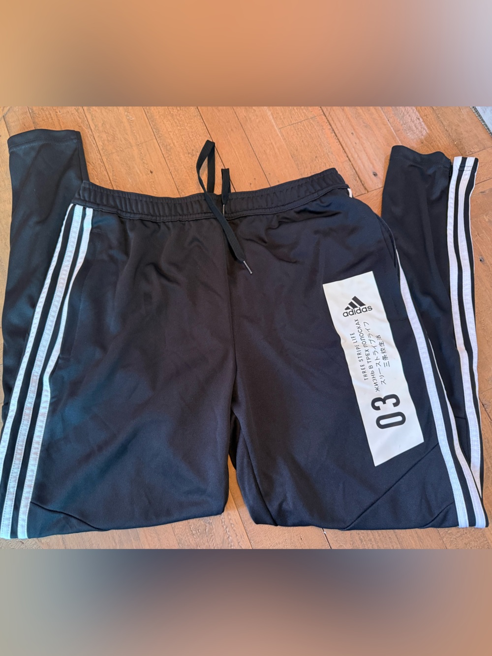 Adidas Black Men’s Athletic Pants with White Three-Stripes